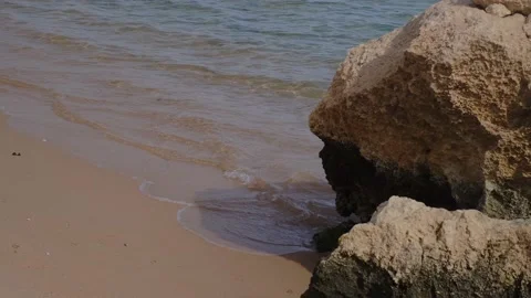Tropical beach with sun umbrellas on the Red Sea near the coral reef. Egypt. Pan 動画素材 236570877