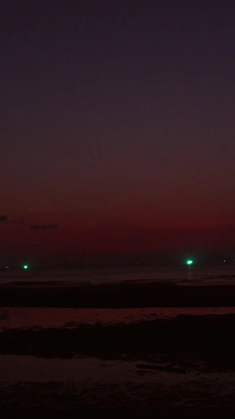 Tropical Beach Sunset with Crescent Moon and Ocean Lights, dramatic twilight sky Vídeo Stock 331416360