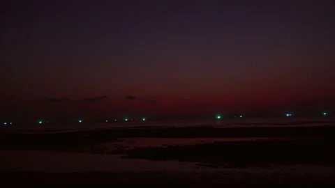 Tropical Beach Sunset with Crescent Moon and Ocean Lights, dramatic twilight sky Vídeo Stock 331417022