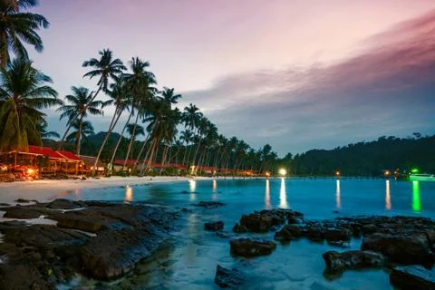 Tropical beach at sunset. Stock Photos