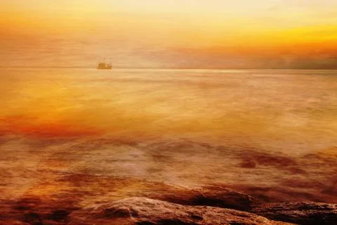 Tropical beach at sunset. Stock Photos