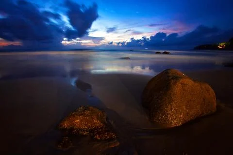 Tropical beach at sunset. Stock Photos