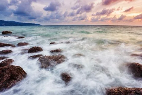 Tropical beach at sunset. Stock Photos