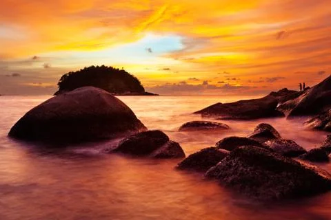 Tropical beach at sunset. Stock Photos