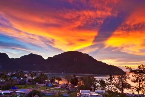 Tropical beach at sunset. Stock Photos