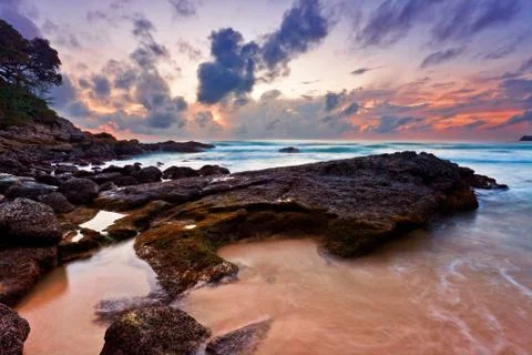 Tropical beach at sunset. Stock Photos