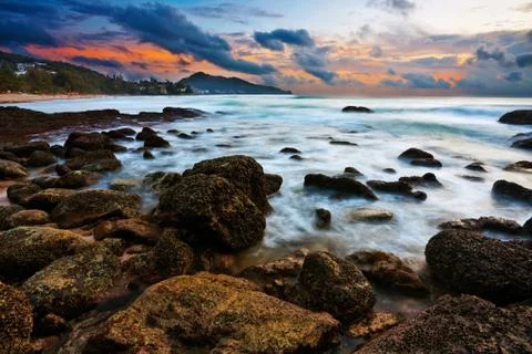 Tropical beach at sunset. Stock Photos
