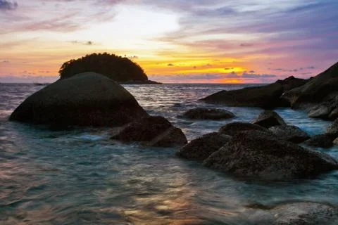 Tropical beach at sunset. Stock Photos