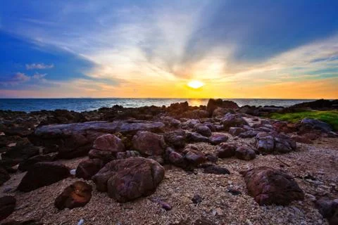 Tropical beach at sunset. Stock Photos