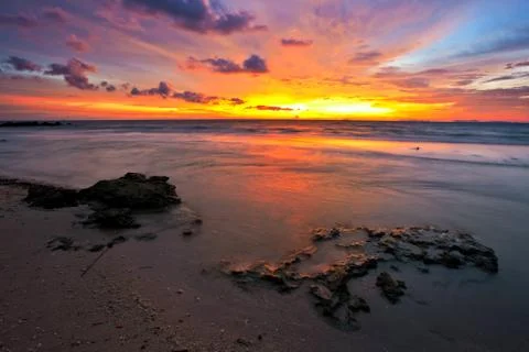 Tropical beach at sunset. Stock Photos