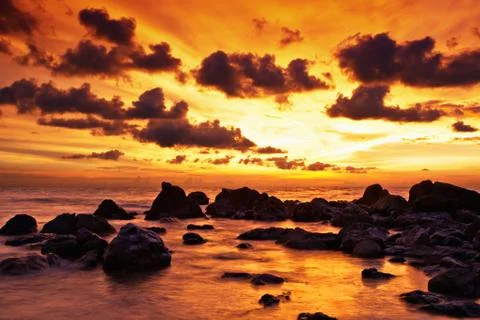 Tropical beach at sunset. Stock Photos