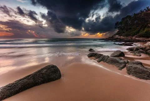 Tropical beach at sunset. Stock Photos