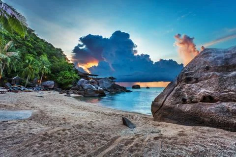 Tropical beach at sunset. Stock Photos
