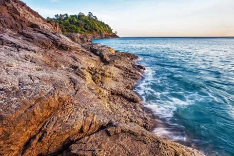 Tropical beach at sunset. Stock Photos