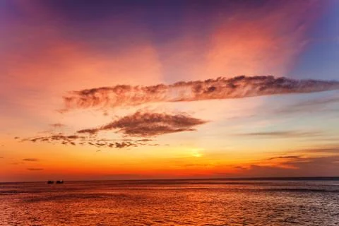 Tropical beach at sunset. Stock Photos