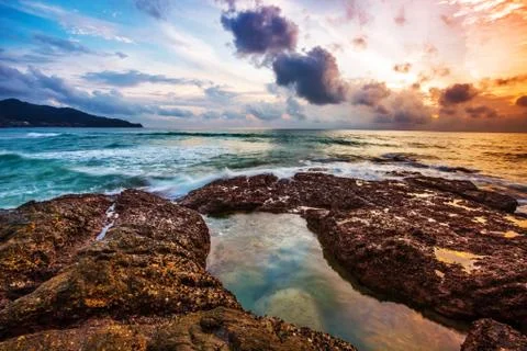 Tropical beach at sunset. Stock Photos
