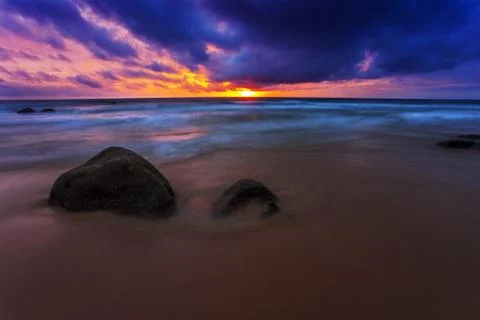 Tropical beach at sunset. Stock Photos