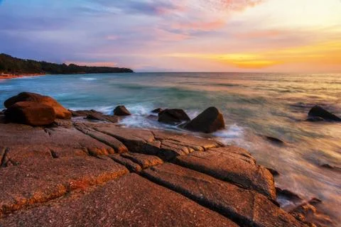 Tropical beach at sunset. Stock Photos