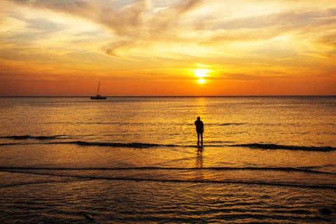 Tropical beach at sunset. Stock Photos