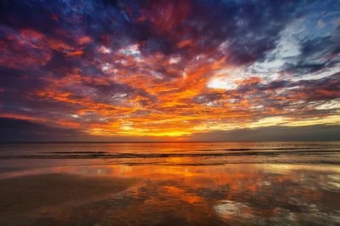 Tropical beach at sunset. Stock Photos