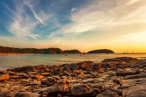 Tropical beach at sunset. Stock Photos