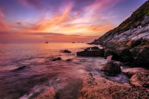 Tropical beach at sunset. Stock Photos