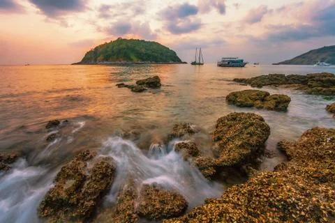 Tropical beach at sunset. Stock Photos