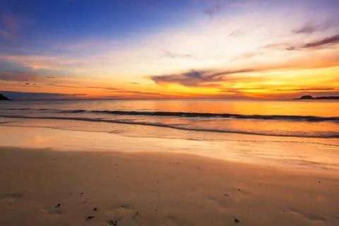 Tropical beach at sunset. Stock Photos