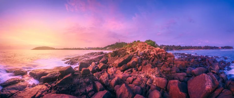 Tropical beach on sunset Stock Photos