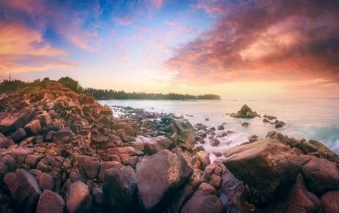 Tropical beach on sunset Stock Photos
