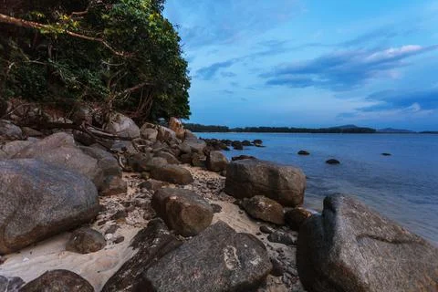 Tropical beach at sunset. Stock Photos