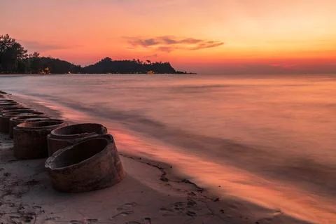 Tropical beach at sunset. Stock Photos