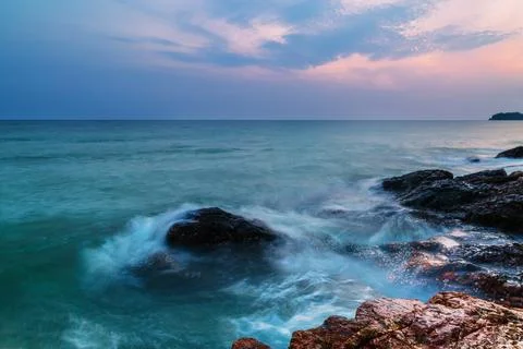 Tropical beach at sunset. Stock Photos
