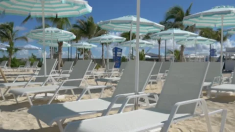 Tropical Beach with Umbrellas Stock Footage 347912470