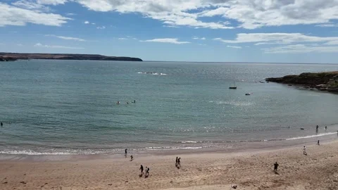 Tropical Beach Waves and Sand on Warm Day Drone Footage Stock Footage 342294834