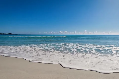 Tropical Beach Waves Crashing White Sand - 4K Drone Aerial Video stock 342897544