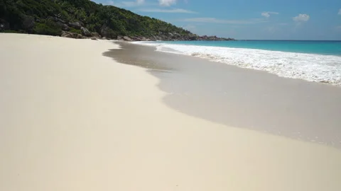 Tropical Beach With White Sand And Blue Sky With Clouds Stock Footage 111877553