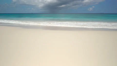 Tropical Beach With White Sand And Blue Sky With Clouds Stock Footage 115949941