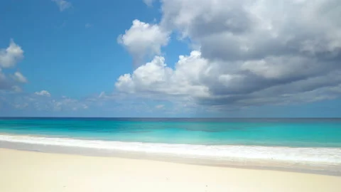 Tropical Beach With White Sand And Blue Sky With Clouds Stock Footage 115949953
