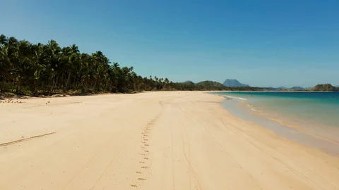 Tropical beach with white sand, view from above. Stock Footage 118673024