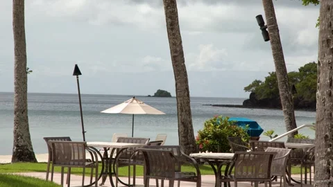 Tropical Beachfront Resort Outdoor Dining Area with Ocean View in Palau Stock-Footage 329343901