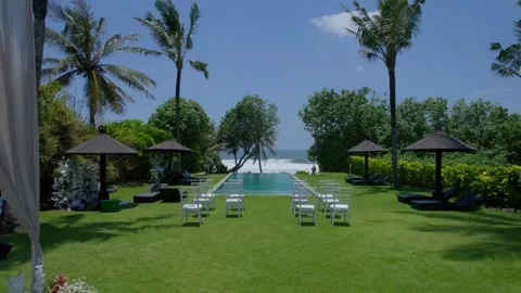 Tropical Beachfront Villa Wedding Setup with Ocean View, Celebration in Paradise Stock Footage 312377431