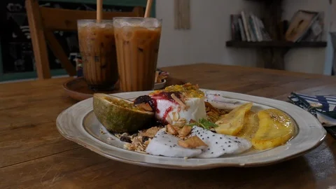 Tropical breakfast with cold coffee Stock Footage 101937626