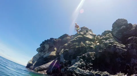 Tropical Cliff Jumping into Blue Ocean. Stock Footage 54141658