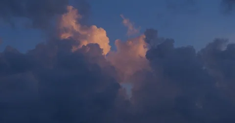 Tropical clouds at sunset Stock Footage 127129333
