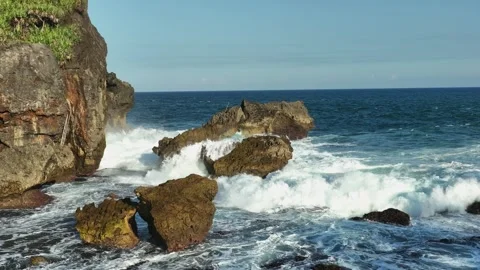 Tropical Coastline with Sea Stack and Ocean Waves Stock Footage 339621374