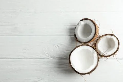 Tropical coconuts on white background, space for text Stock Photos