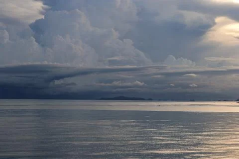 Tropical dramatic cloudscape at dusk Stock Photos