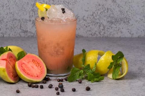Tropical drink on gray background Stock Photos
