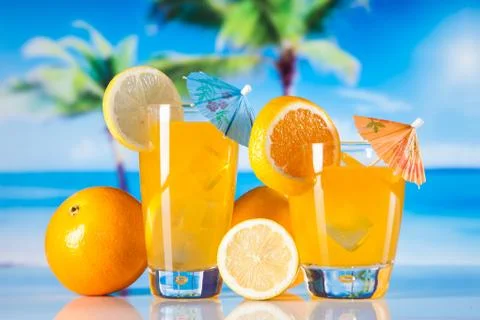 Tropical drinks on beach Stock Photos